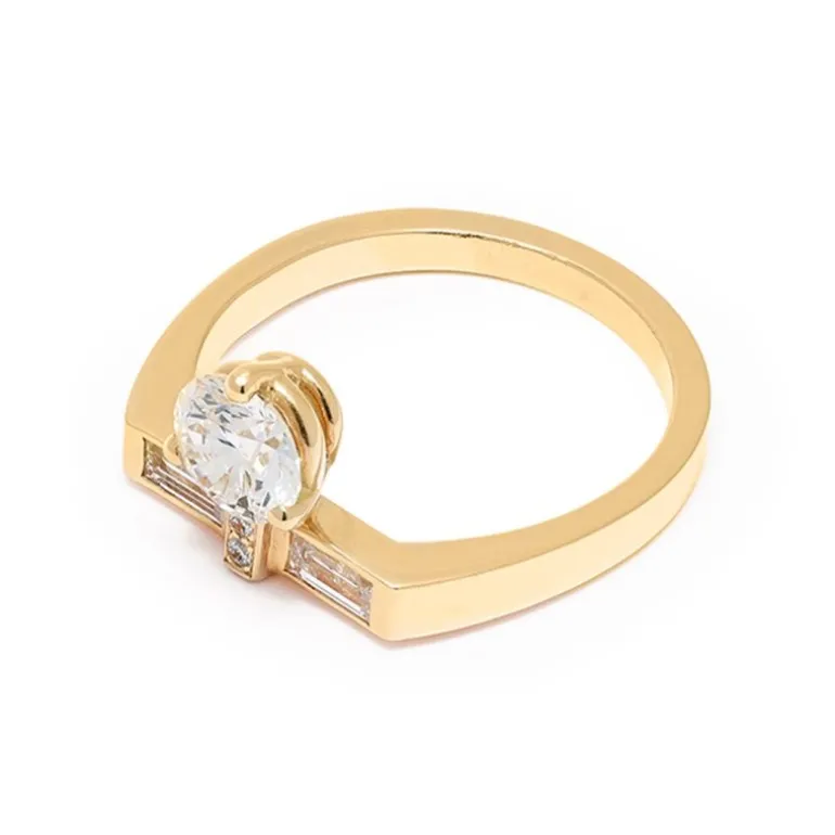 Solitaire Uraeus 0.7ct pavé baguette
